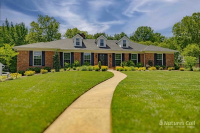Greenville Delaware home with curved walkway and finished front landscaping